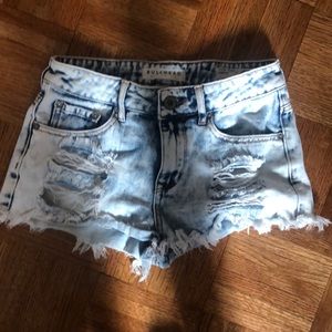 Distressed denim shorts